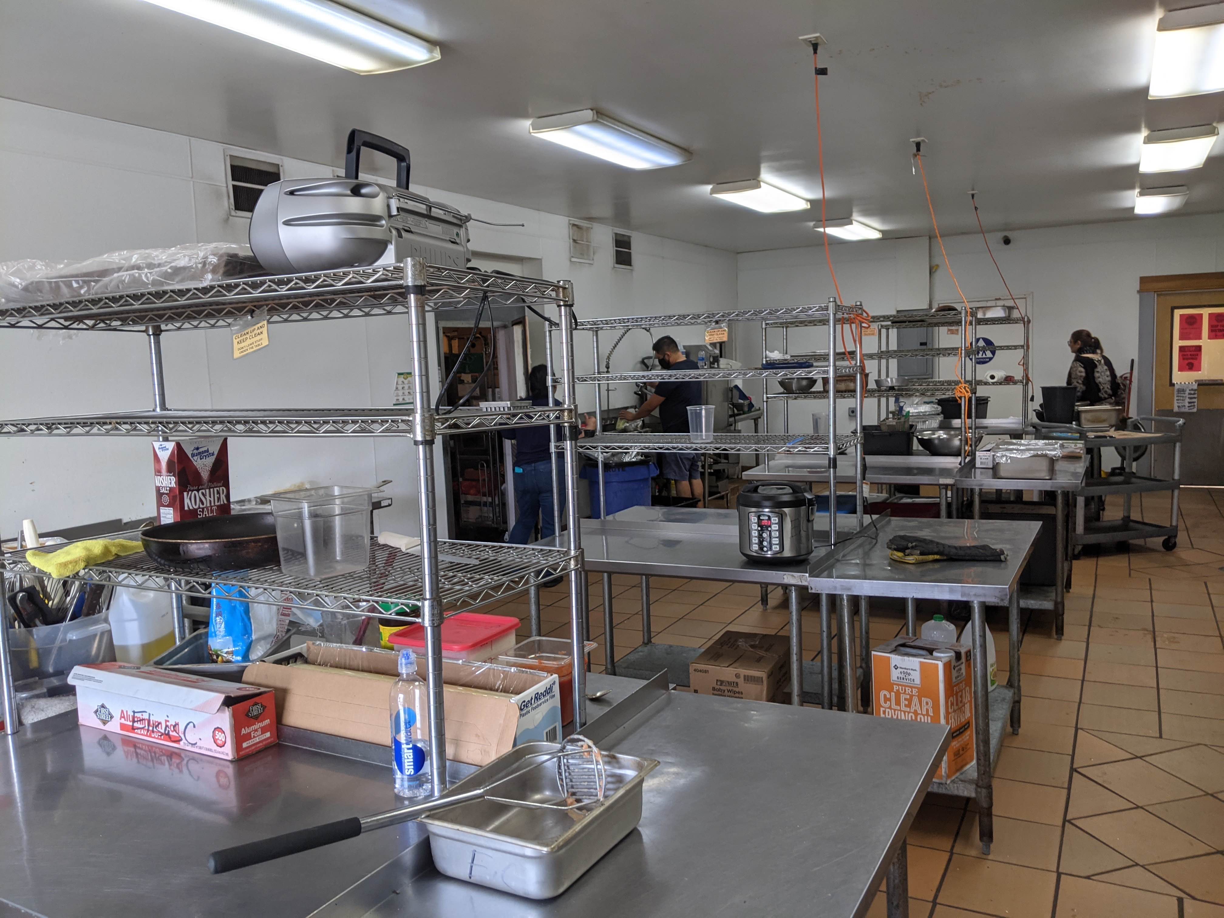 Pak Food commercial kitchen during prep with the team working